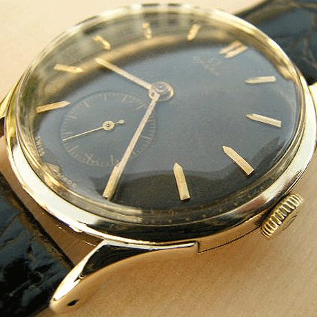 Omega 14k gold watch vintage deals
